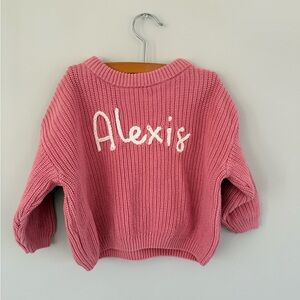 Pink Knit Sweater with White Lettering
